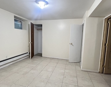 1043 East 14 Street - Photo Thumbnail 3