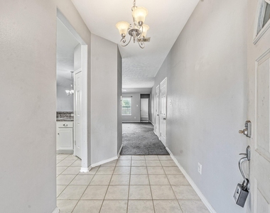 7107 Piney Meadow Court - Photo Thumbnail 3