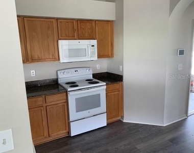 11802 Lynmoor Drive - Photo Thumbnail 3