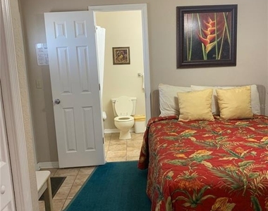 2777 N Poinciana Boulevard - Photo Thumbnail 3