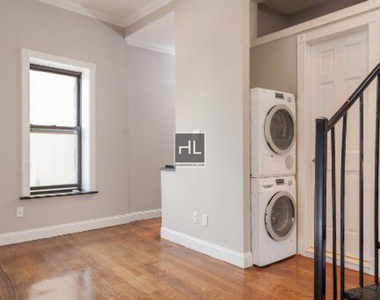 E 100th St. - Photo Thumbnail 3