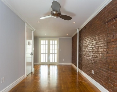 E 7th St. - Photo Thumbnail 2