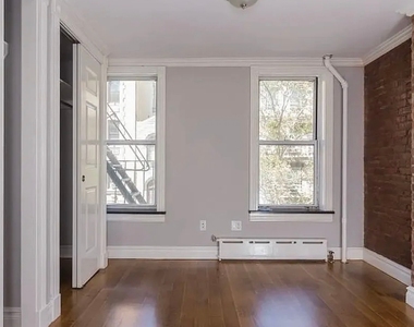 E 7th St. - Photo Thumbnail 3