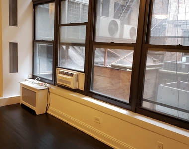 West 9 Street - Photo Thumbnail 8