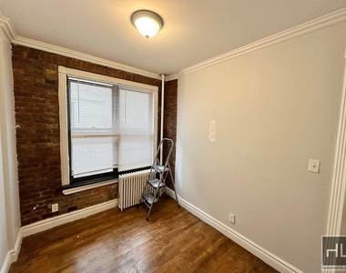 E 13th St. - Photo Thumbnail 3