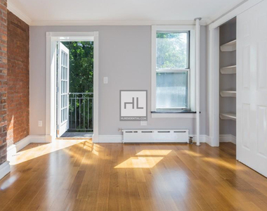 E 7th St. - Photo Thumbnail 6