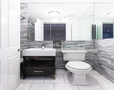 W 52nd St. - Photo Thumbnail 4