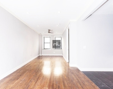 W 52nd St. - Photo Thumbnail 2