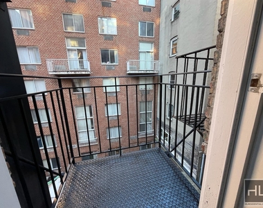 East 23 Street - Photo Thumbnail 2