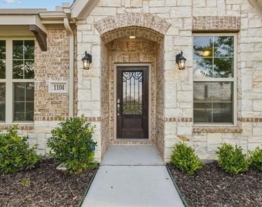 1104 Milfoil Drive - Photo Thumbnail 1