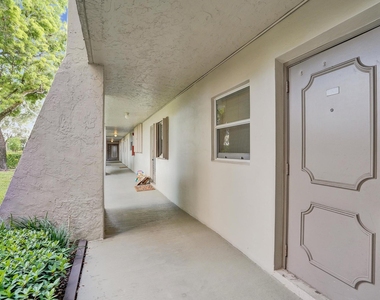 9460 Poinciana Place - Photo Thumbnail 1