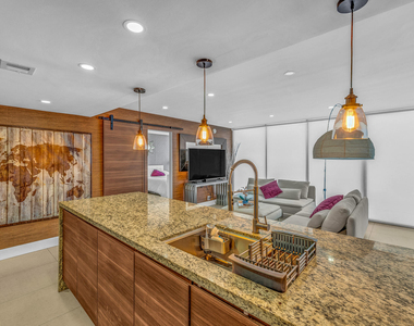 7601 E Treasure Drive - Photo Thumbnail 1