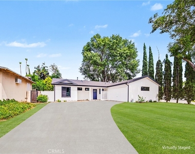 8738 Monogram Avenue - Photo Thumbnail 1