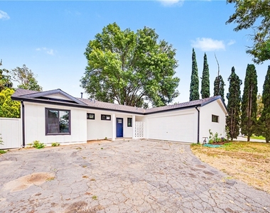 8738 Monogram Avenue - Photo Thumbnail 3