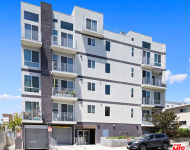 1055 S Serrano Avenue - Photo Thumbnail 1