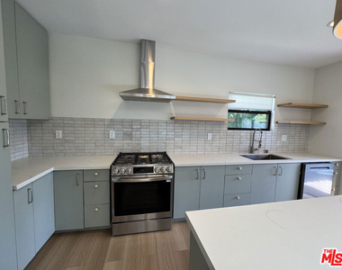 8587 1/2 Rugby Drive - Photo Thumbnail 2