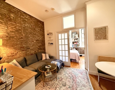237 E 58th St - Photo Thumbnail 2