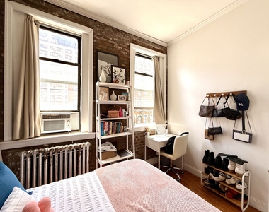 237 E 58th St - Photo Thumbnail 1