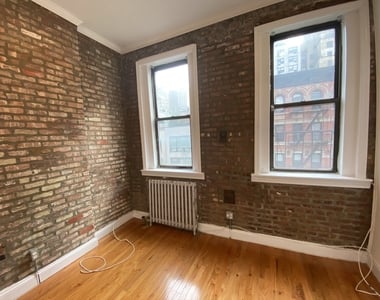 237 E 58th St - Photo Thumbnail 11