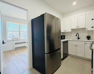 6024 Wetherole Street - Photo Thumbnail 2