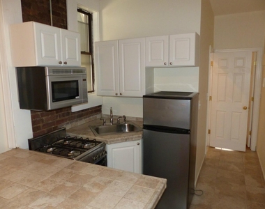 419 W 44th Street - Photo Thumbnail 6