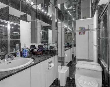 304 E 65th Street - Photo Thumbnail 9