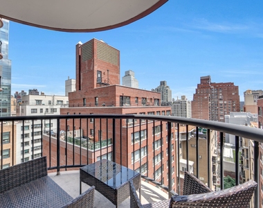 304 E 65th Street - Photo Thumbnail 3
