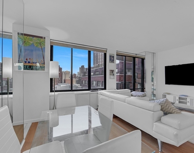304 E 65th Street - Photo Thumbnail 2