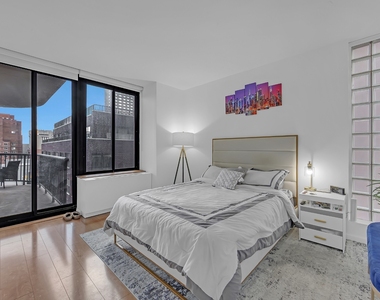 304 E 65th Street - Photo Thumbnail 6