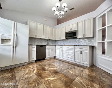 11395 S Aston Hall Drive - Photo Thumbnail 4
