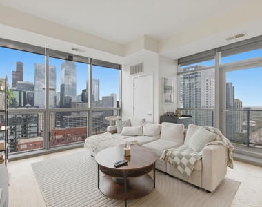 303 W Ohio Street - Photo Thumbnail 1
