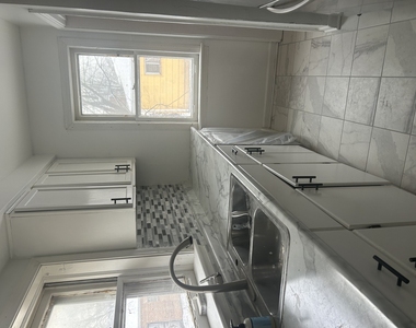12748 S Lowe Avenue - Photo Thumbnail 3