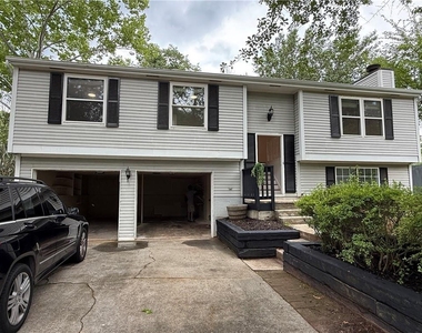 10415 Plantation Bridge Drive - Photo Thumbnail 1