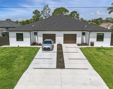1011 & 1013 Abrams Boulevard - Photo Thumbnail 1