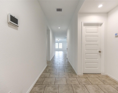 7547 Cattle Walker Court - Photo Thumbnail 2