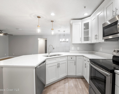 7667 N Wickham Road - Photo Thumbnail 5