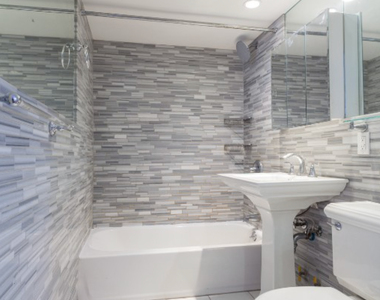 E 100th St. - Photo Thumbnail 2