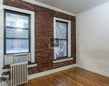 E 13th St. - Photo Thumbnail 1