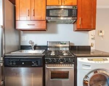 E 13th St. - Photo Thumbnail 7