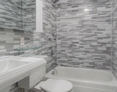 E 13th St. - Photo Thumbnail 8