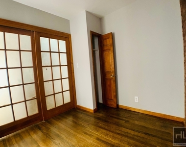 E 13th St. - Photo Thumbnail 2