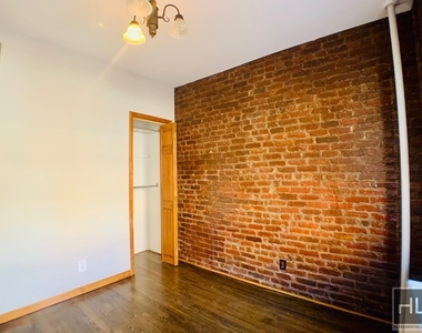 E 13th St. - Photo Thumbnail 5