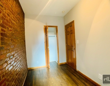 E 13th St. - Photo Thumbnail 3