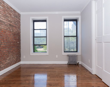 E 100th St. - Photo Thumbnail 2