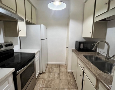 10047 Westpark Drive - Photo Thumbnail 3