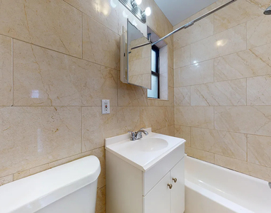 214 East 10th Street - Photo Thumbnail 2