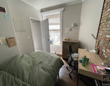 E 13th St. - Photo Thumbnail 5