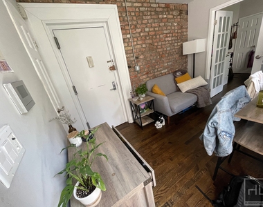 E 13th St. - Photo Thumbnail 3