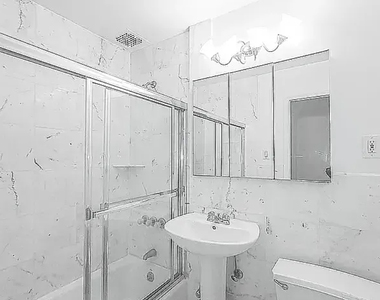 East 83 Street - Photo Thumbnail 3