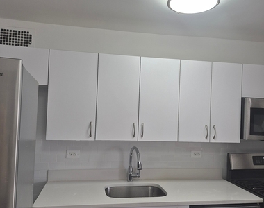 E 16 St - Photo Thumbnail 5